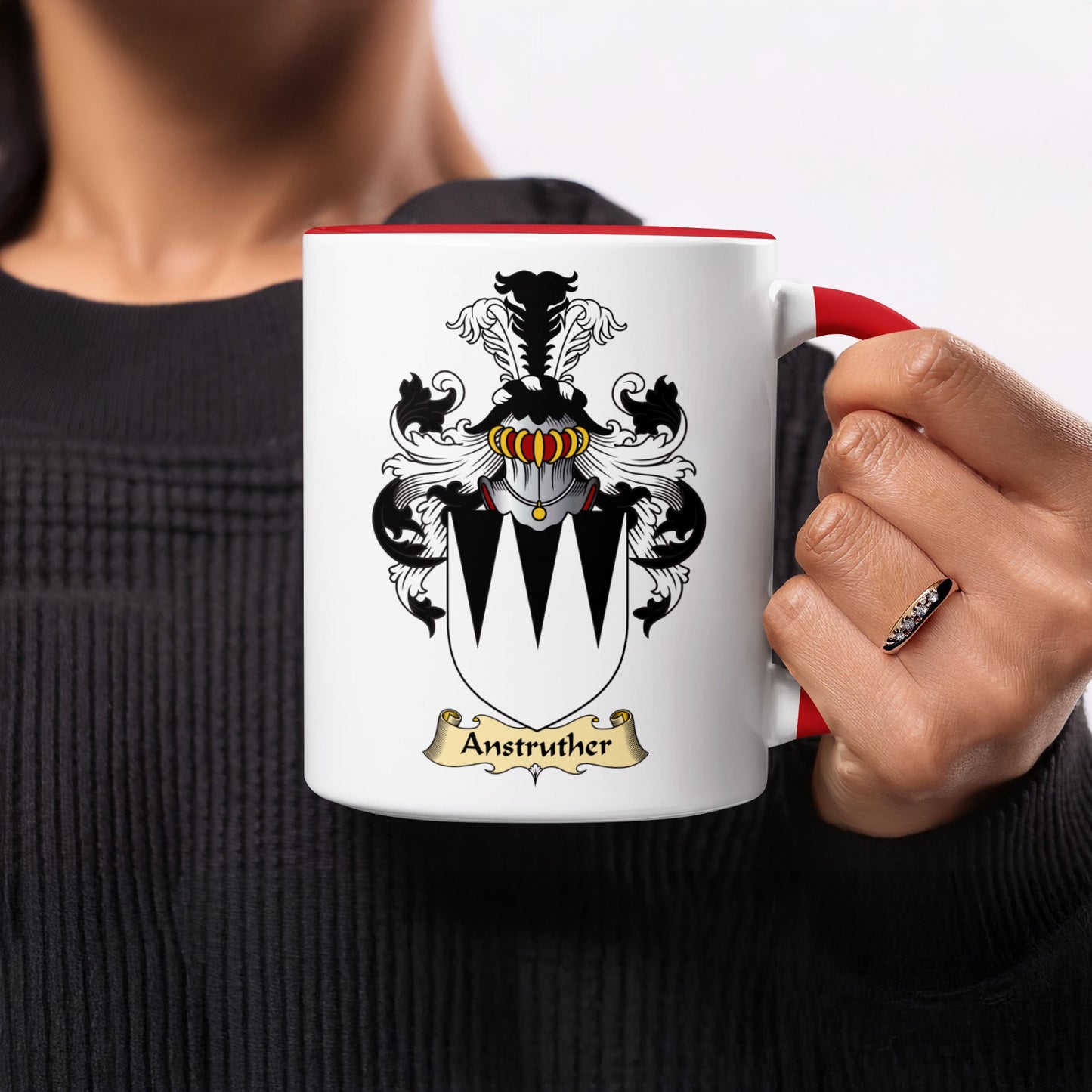 White mug with red handle featuring the Anstruther family crest.