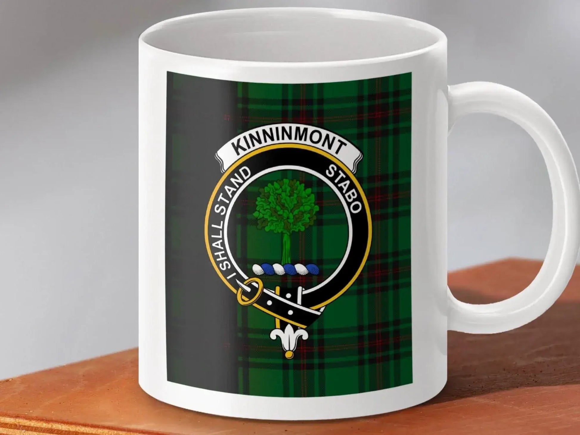 Kinninmont Crest Mug with Tartan Background product