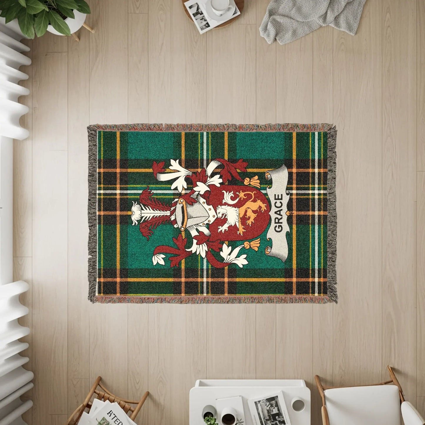 Tartan throw blanket with a coat of arms and the name "Grace."