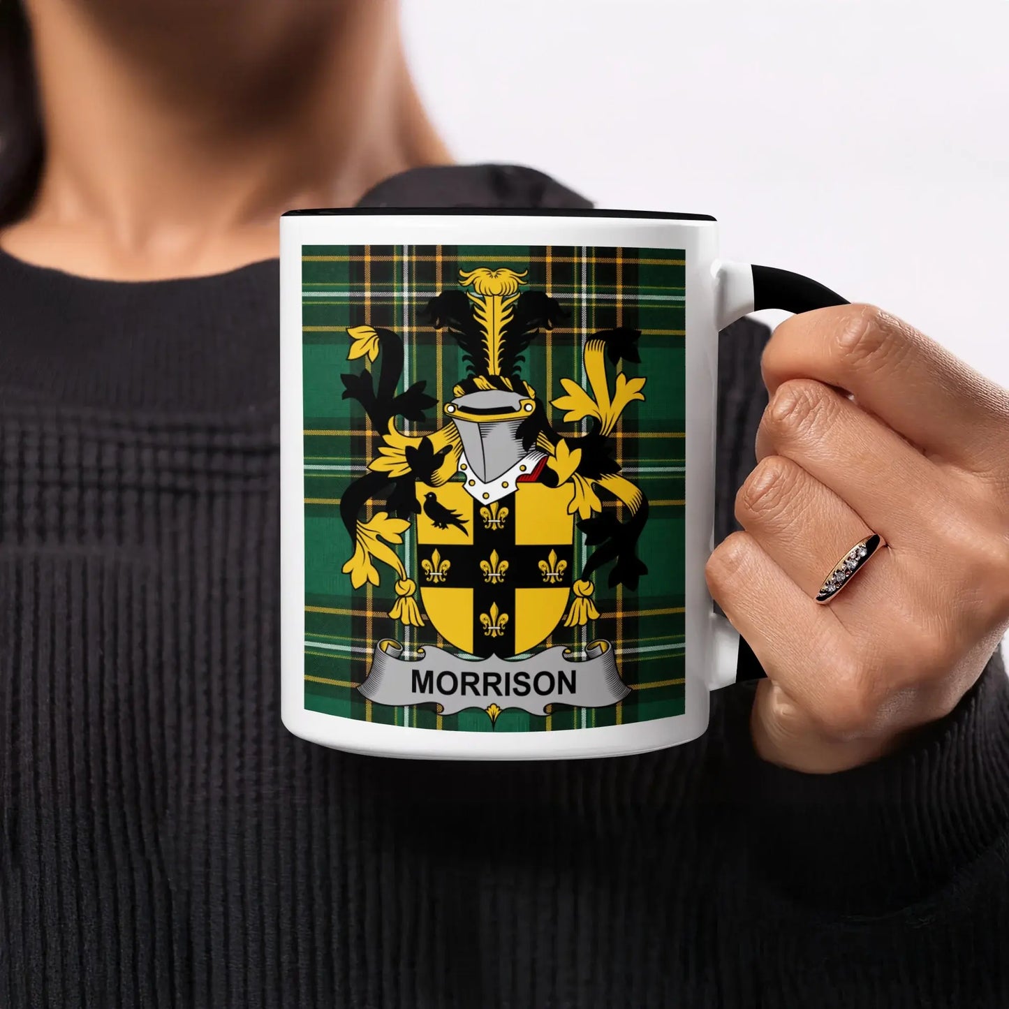 Mug with Morrison family crest on green tartan background.