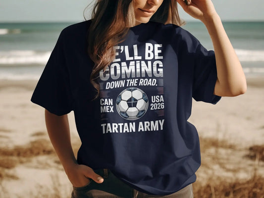 Navy t-shirt with "I'LL BE COMING DOWN THE ROAD" and "TARTAN ARMY" text.