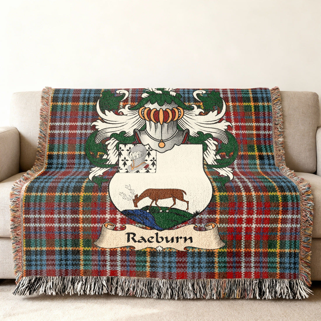 Raeburn surname heritage design on a woven blanket