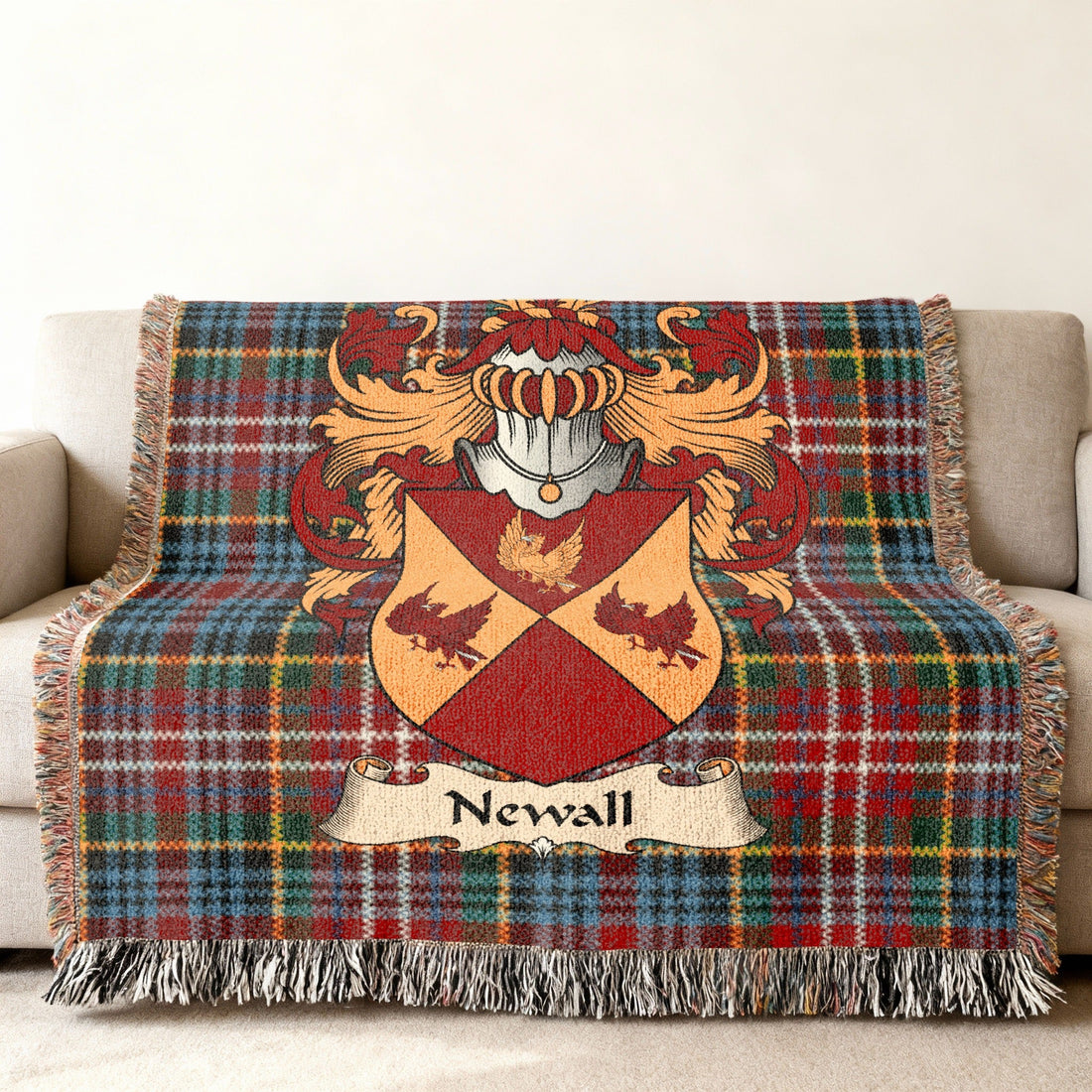 Newall Scottish family shield artwork on a woven blanket with Caledonia tartan-inspired background