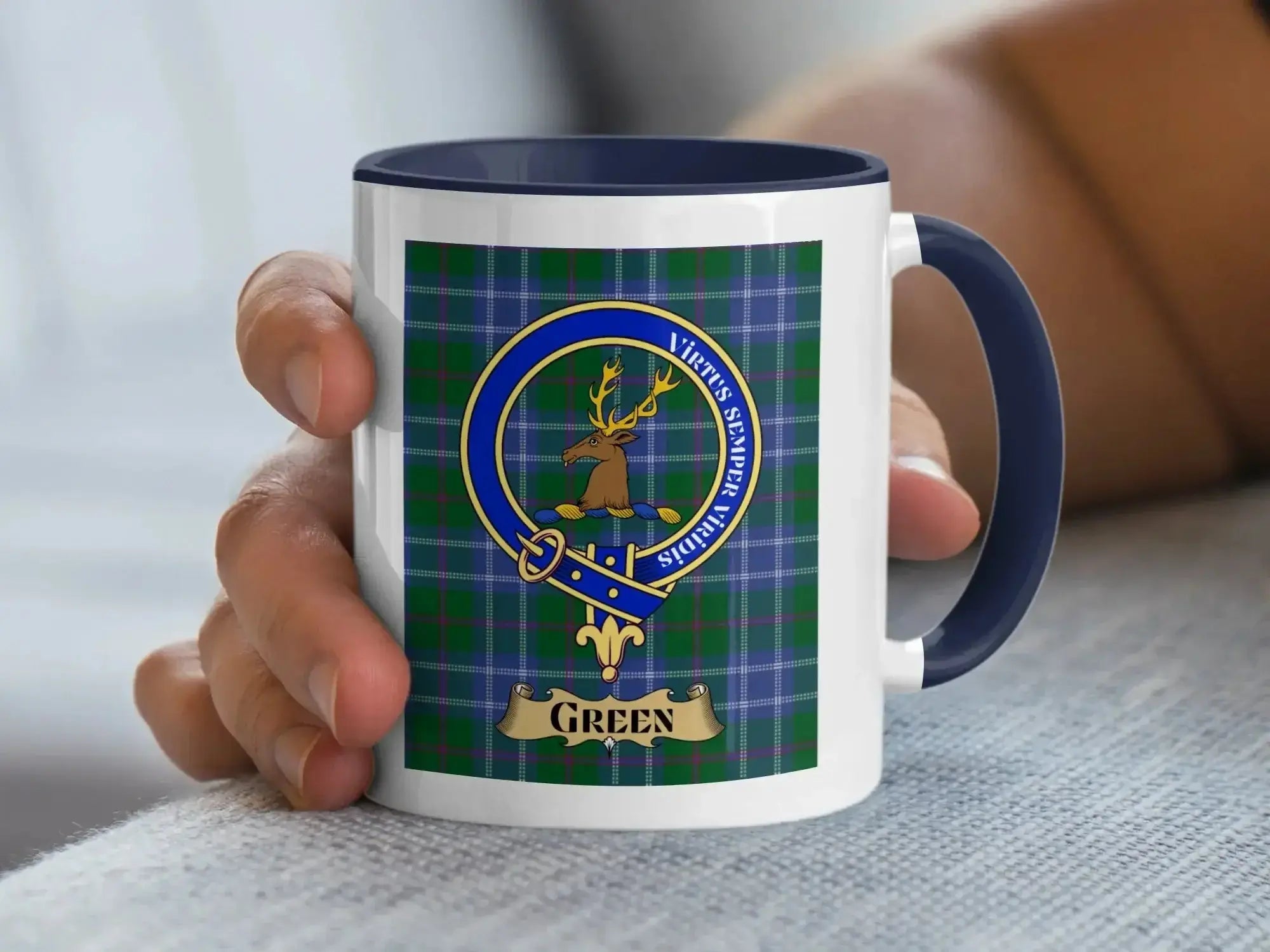 Green family crest mug on a tartan background, a Scottish heritage gift for the Green surname