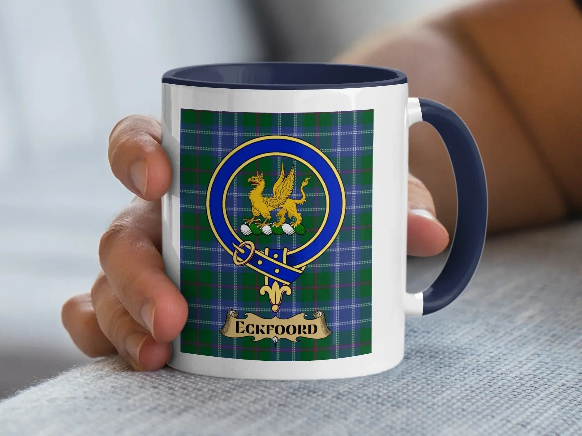 Eckfoord family crest mug on a tartan background, a Scottish heritage gift for the Eckfoord spelling of the Roxburghshire Eckford name