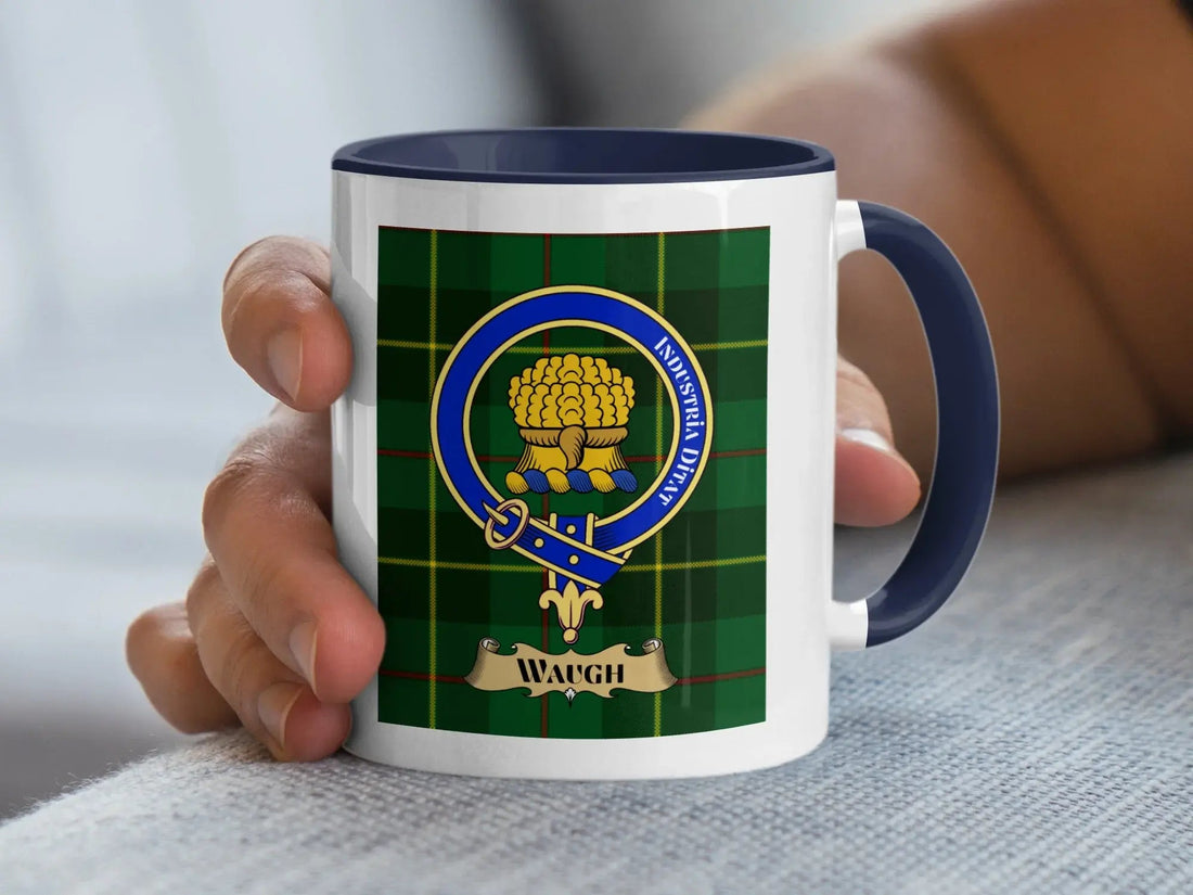 Waugh family crest mug on a tartan background, a heritage gift for a Scottish Borders surname meaning Briton
