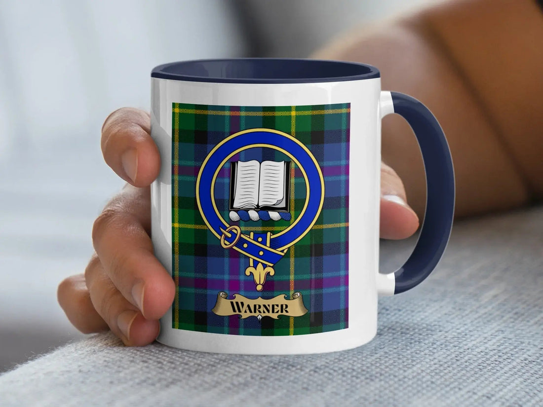 Warner family crest mug on a woven tartan design, a ceramic heritage keepsake for a Norman-rooted surname in Scotland