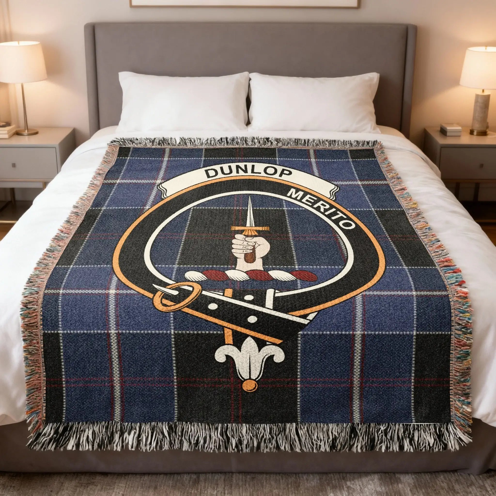 Dunlop clan Scottish tartan woven blanket representing Ayrshire heritage and the motto Merito