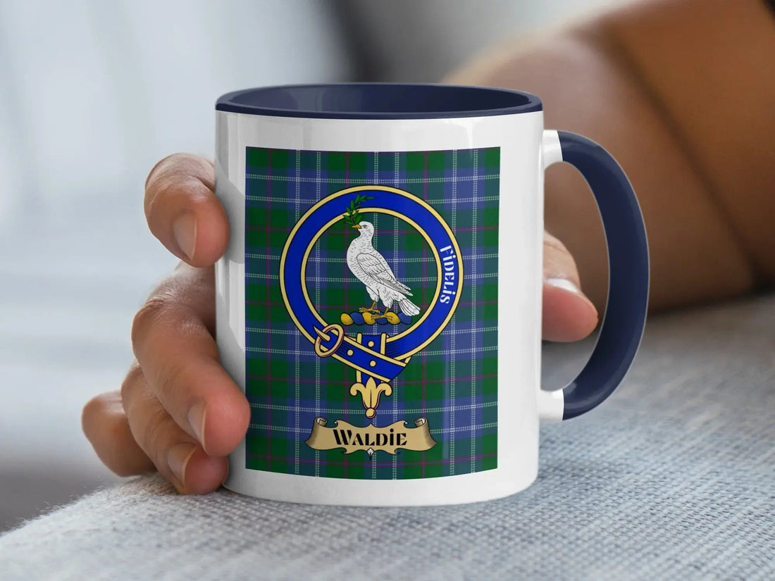Waldie family crest mug on a woven tartan design, a ceramic heritage keepsake for a Scottish Borders surname