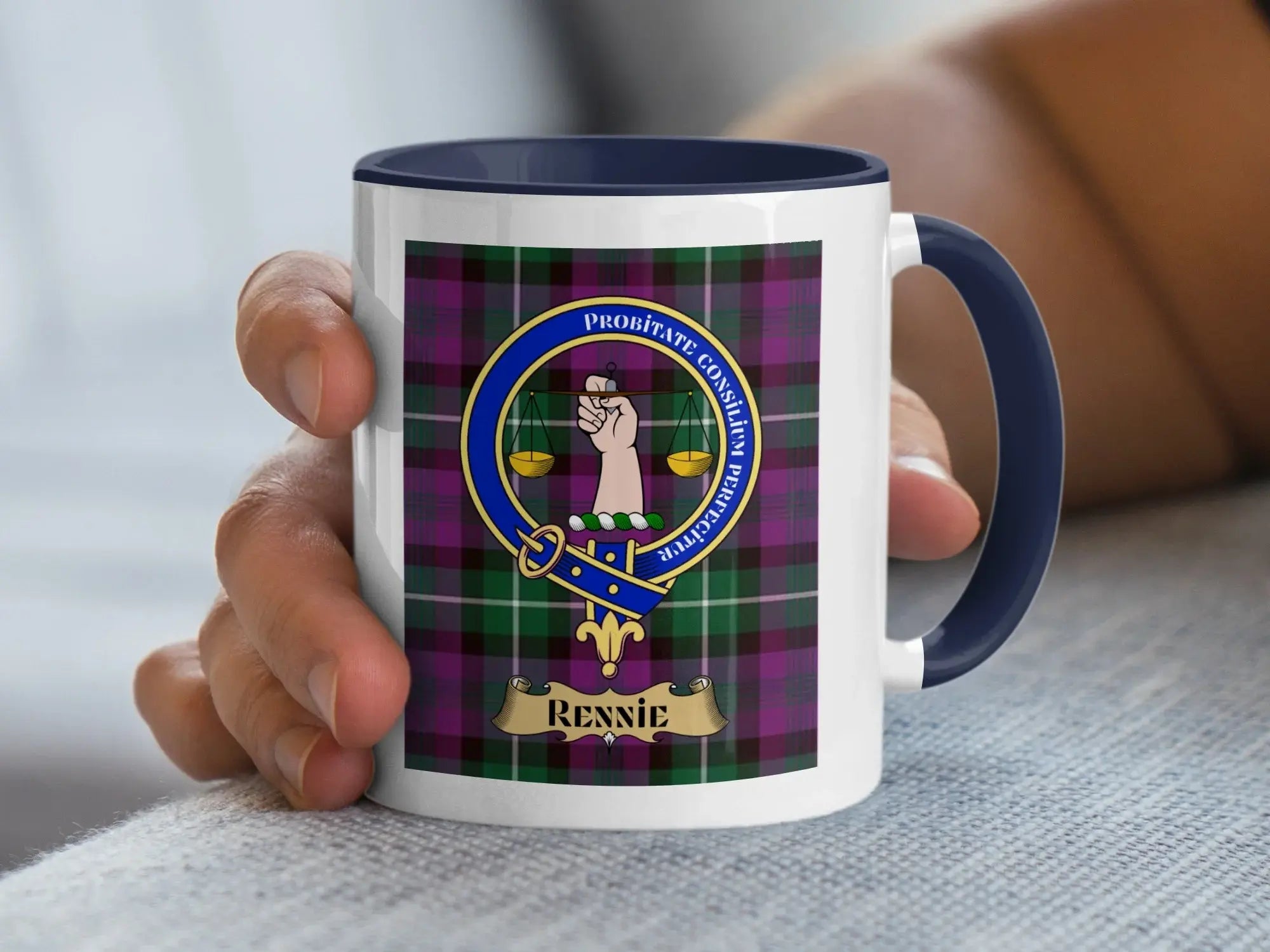 Rennie surname mug with the family crest above a woven tartan background, an East Lothian engineering family keepsake