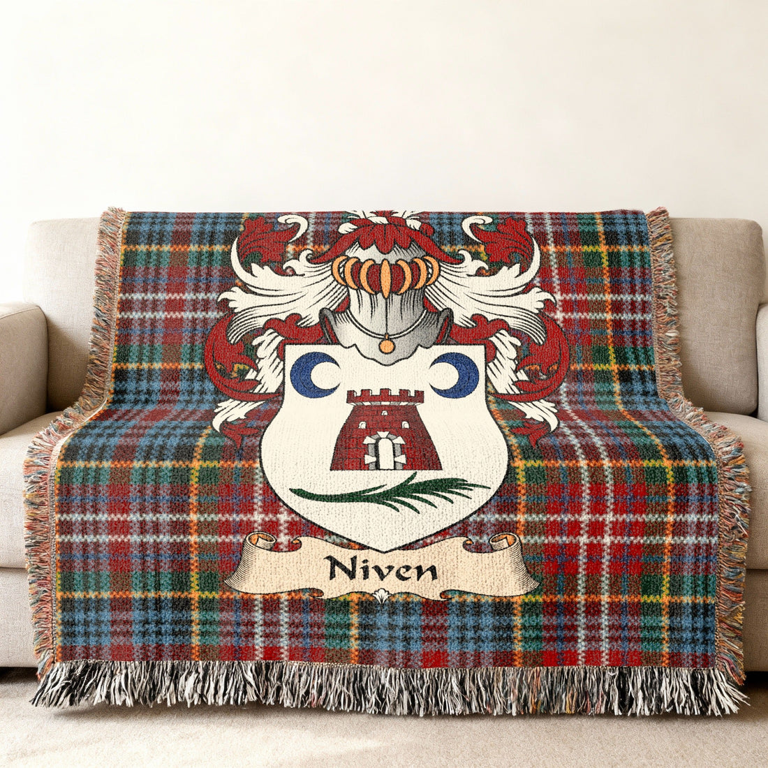 Niven Scottish family shield artwork on a woven blanket with Caledonia tartan-inspired background