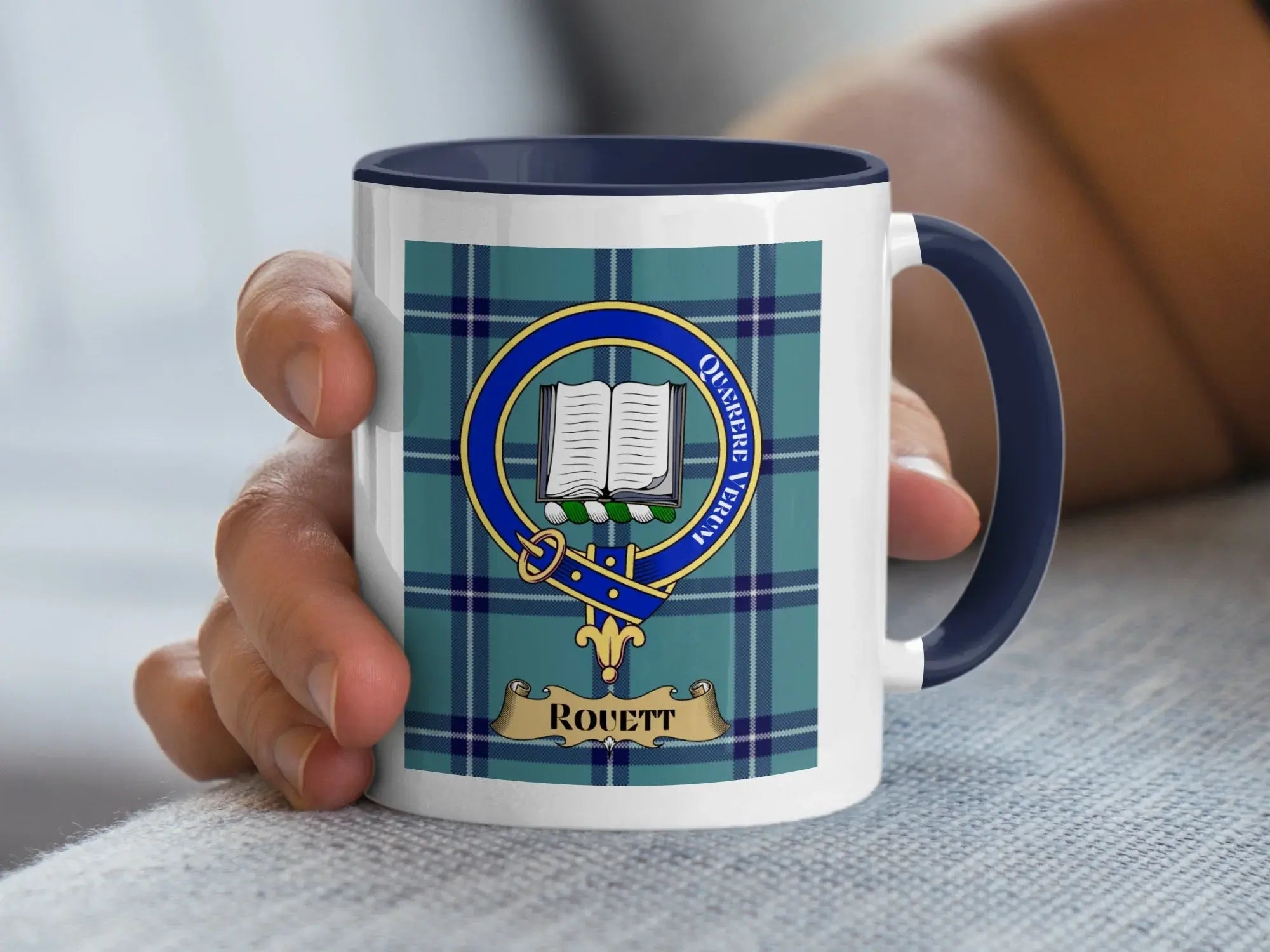 Rouett heritage mug printed with a family crest over tartan, a gift for an unusually rare Scottish surname spelling