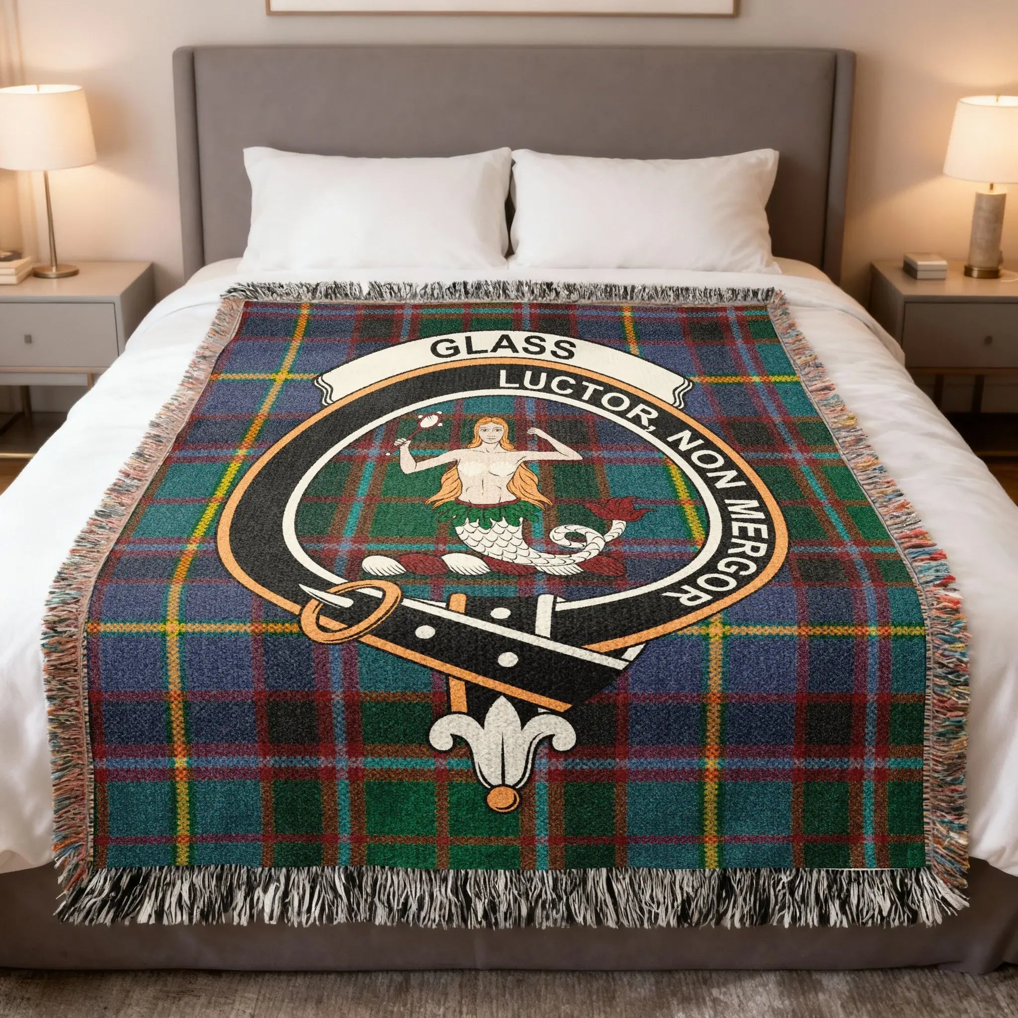 Glass family crest woven blanket on a tartan background, a Scottish heritage throw for the Glass surname