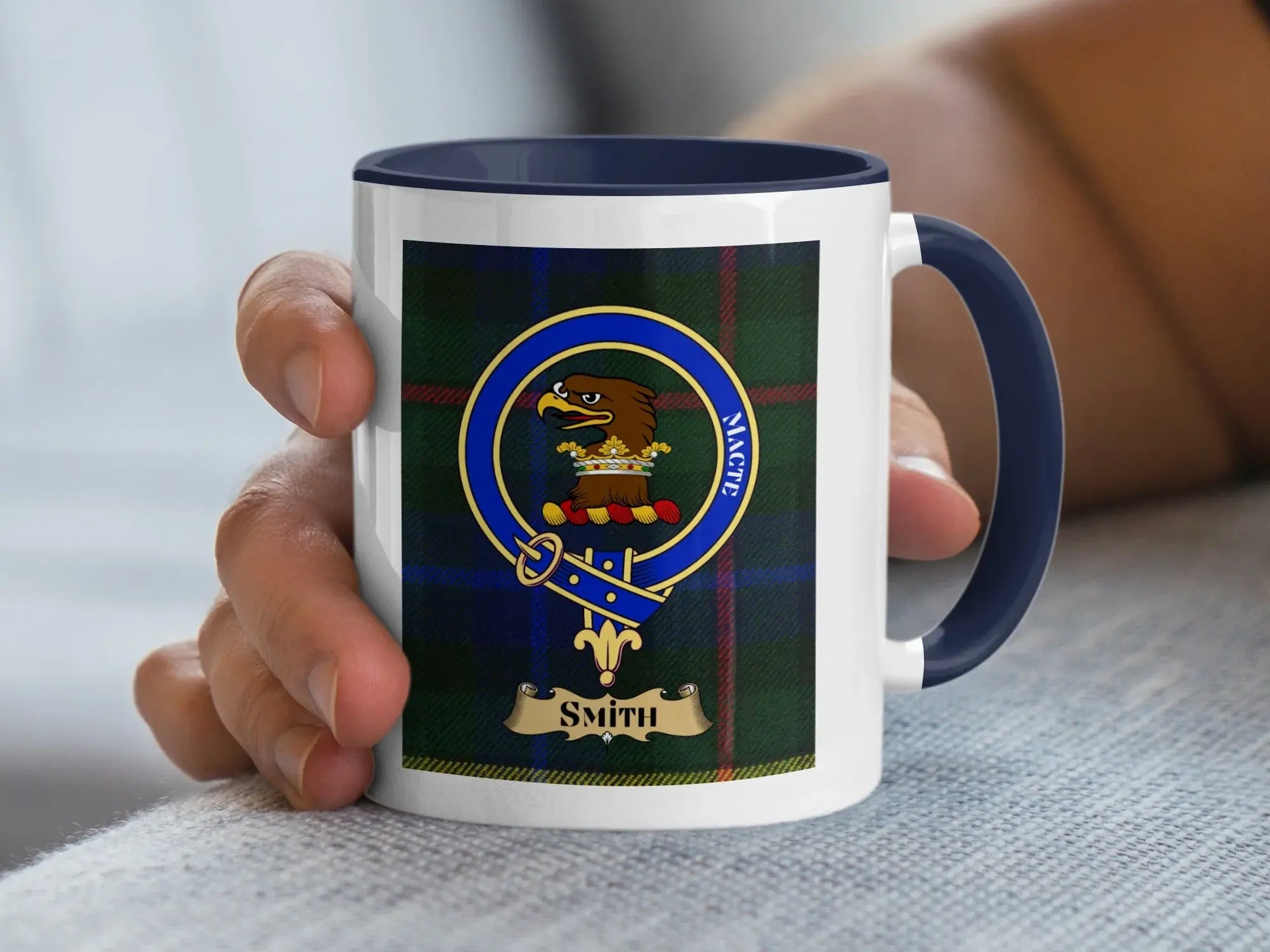 Smith clan crest mug on tartan background, a Scottish heritage gift for the Smith family