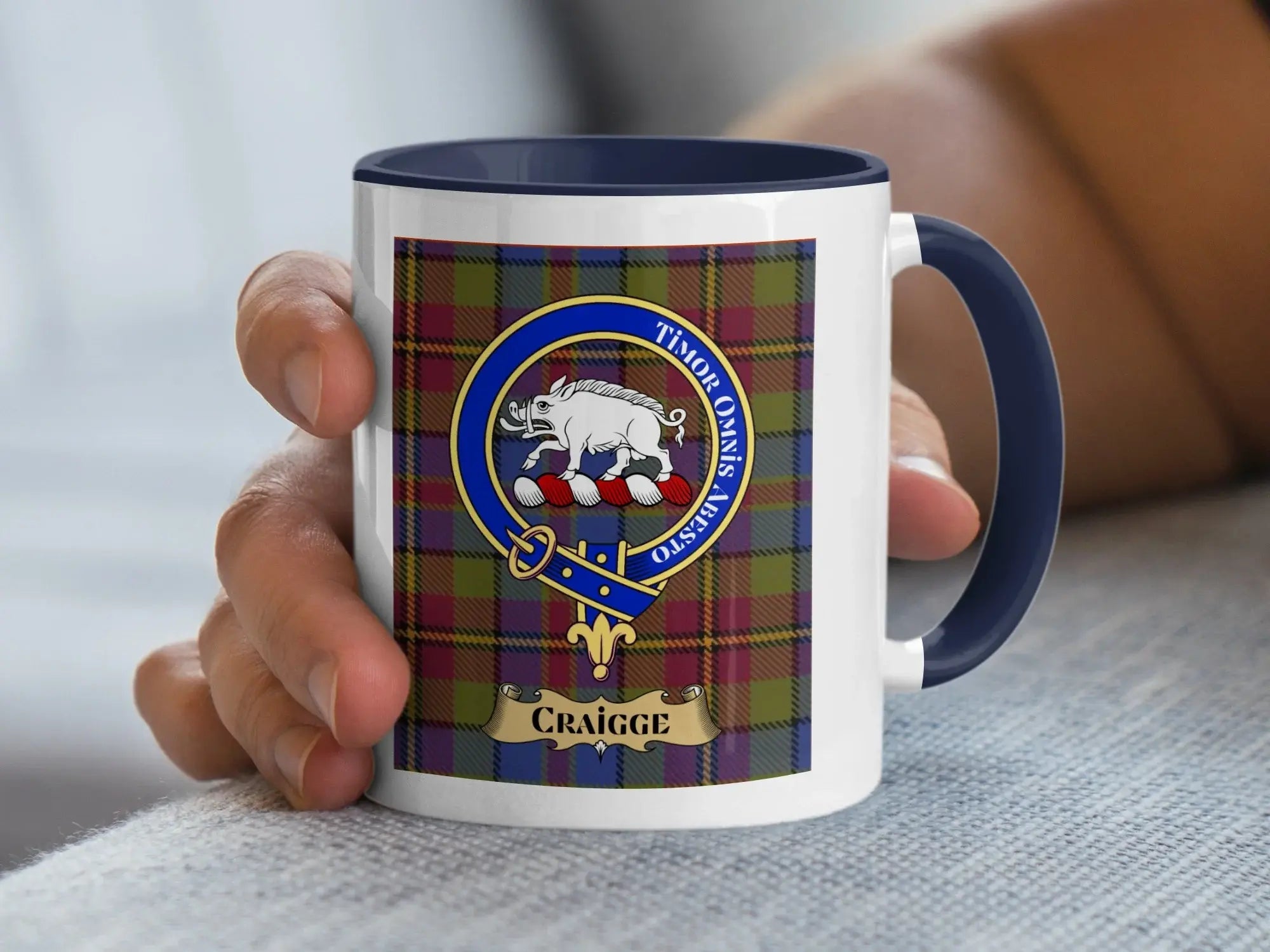 Craigge family crest mug on a tartan background, a Scottish heritage gift for the Craigge spelling of the Craig surname