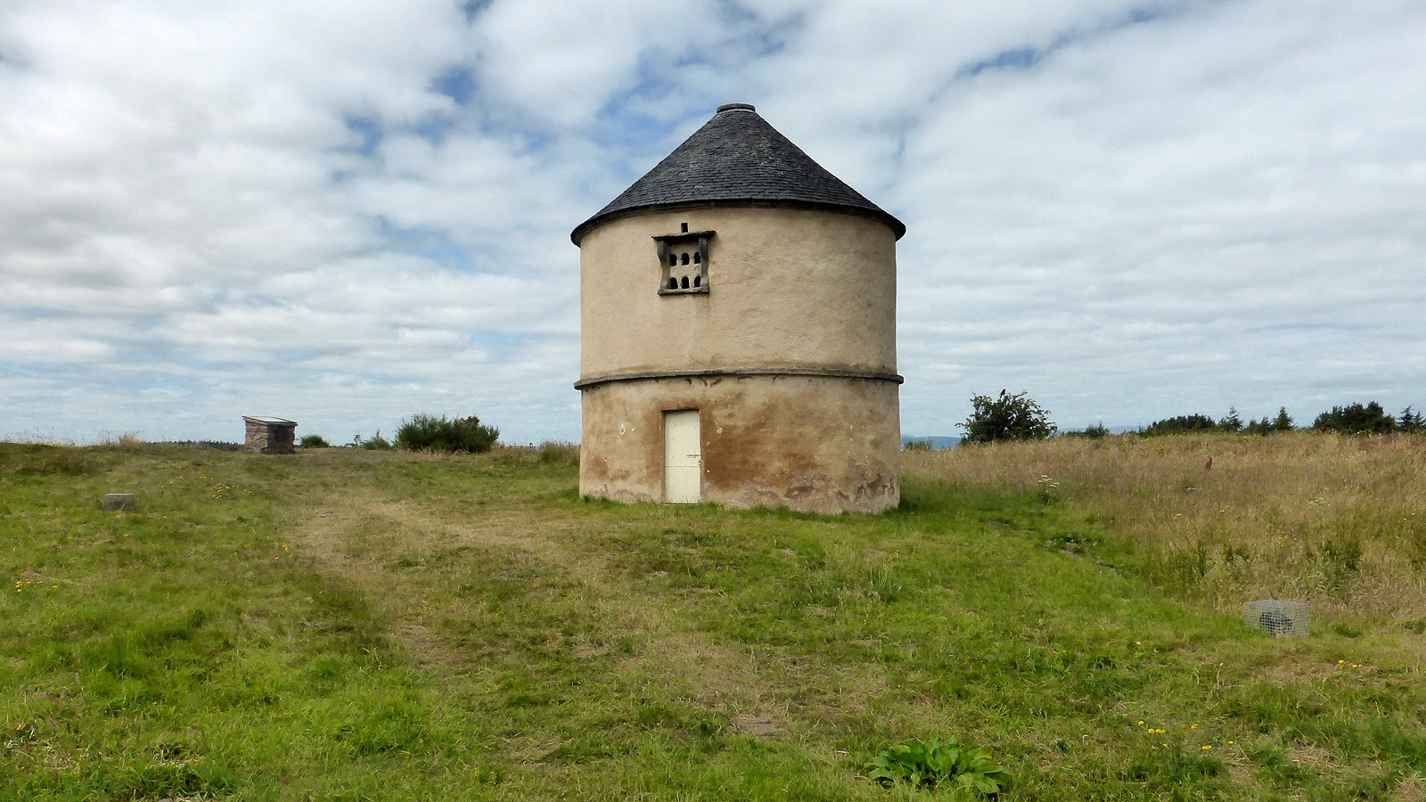 Boath Doocot standing on the ancient castle motte above the village of Auldearn near Nairn, the high ground from which Montrose commanded the 1645 battle where MacColla's regiment held the Covenanting attack before the decisive flank assault