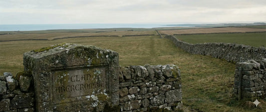 Scottish Lowlands farmland in Fife with stone dykes and rolling fields, featuring the text “Clan Abercrombie,” representing the historic Lowland Scottish clan