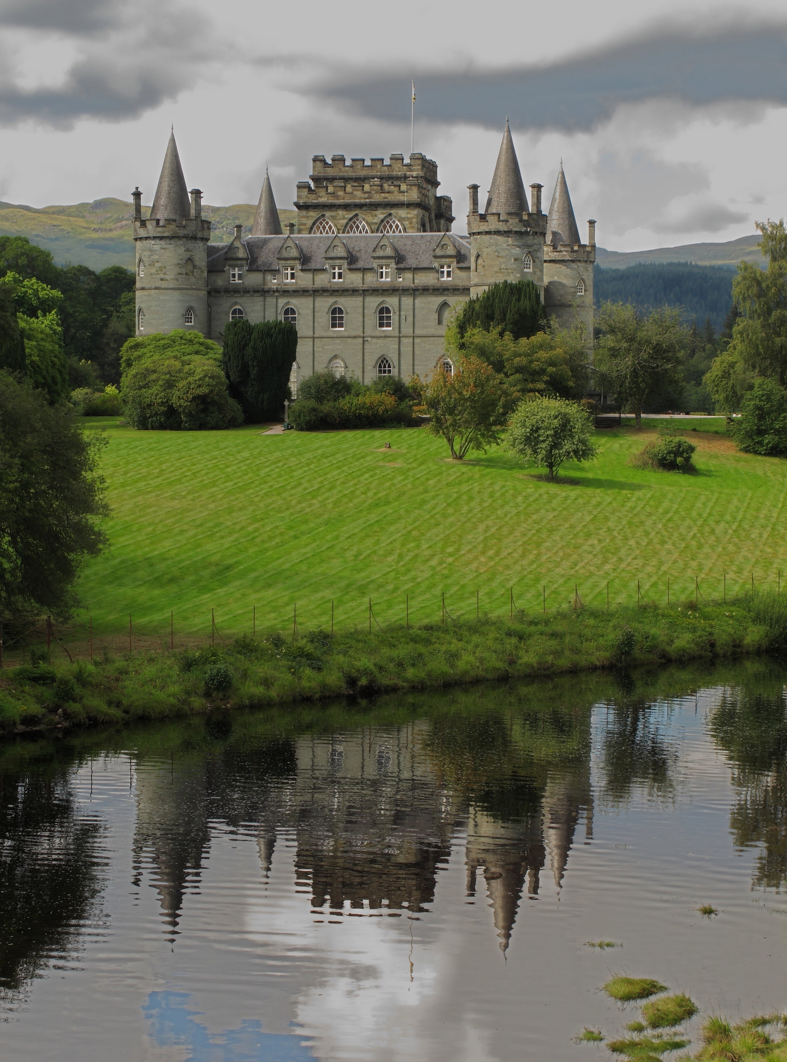 Inveraray Castle on the shores of Loch Fyne in Argyll, the ancestral seat of the Dukes of Argyll and the heart of Campbell power — one of Scotland's earliest Gothic Revival buildings, begun in 1746 at the height of Campbell political dominance