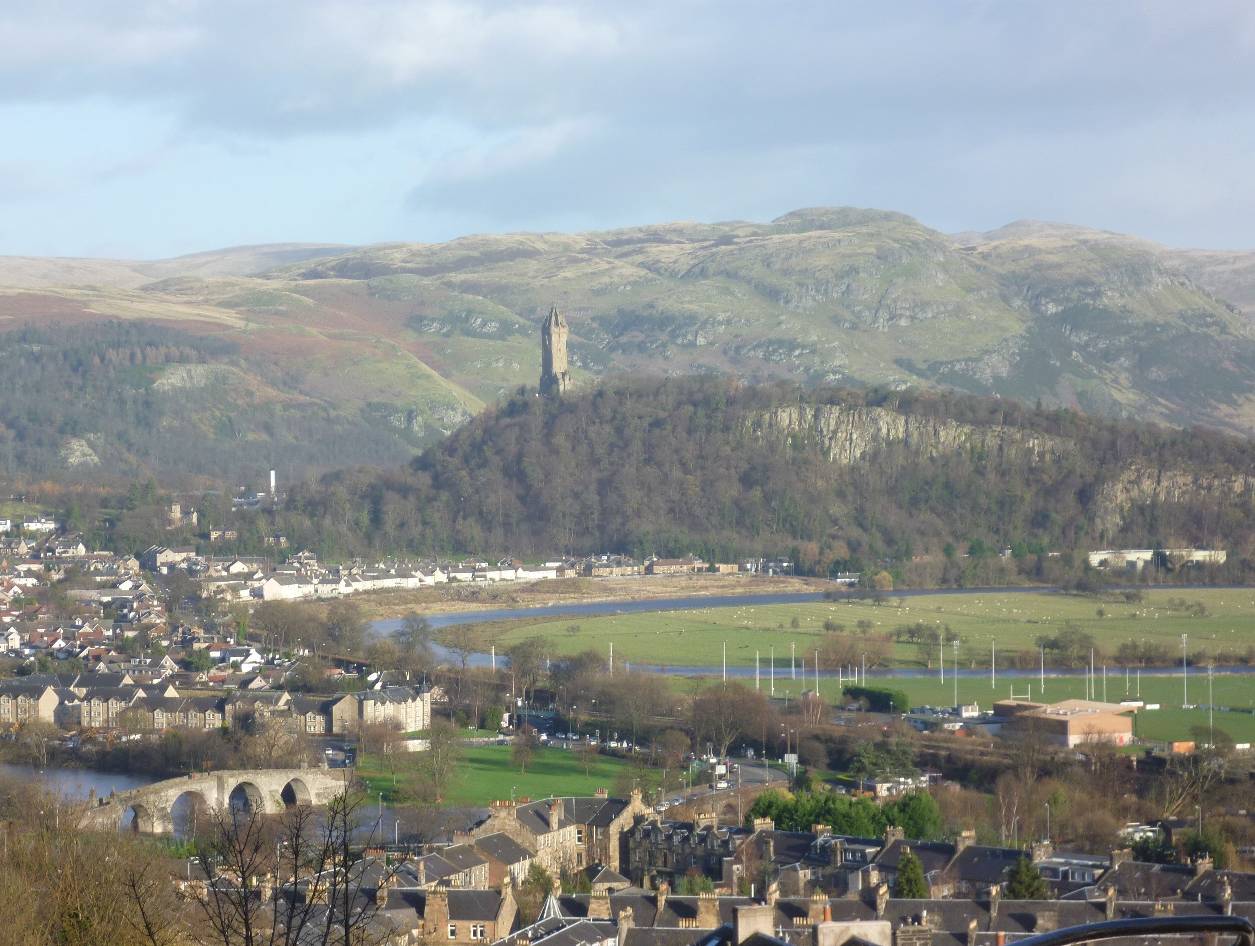 Stirling Bridge over the River Forth with the Wallace Monument on the Abbey Craig, the defining sites of the Wars of Scottish Independence where Stirling Bridge 1297, Falkirk 1298, and Bannockburn 1314 determined Scotland's future