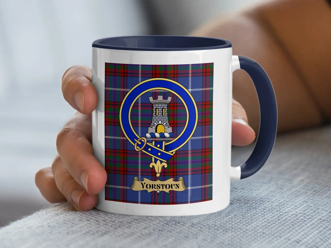Yorstoun family crest mug over a woven tartan background, a keepsake for one of Scotland's rarest surname spellings