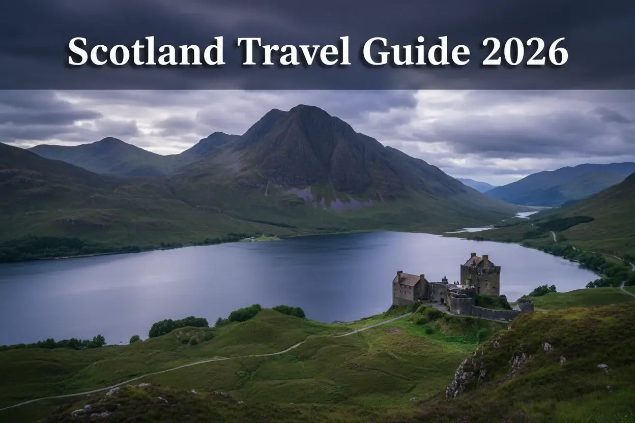 Scottish castle beside a lake and mountains under cloudy sky, Scotland travel guide 2026