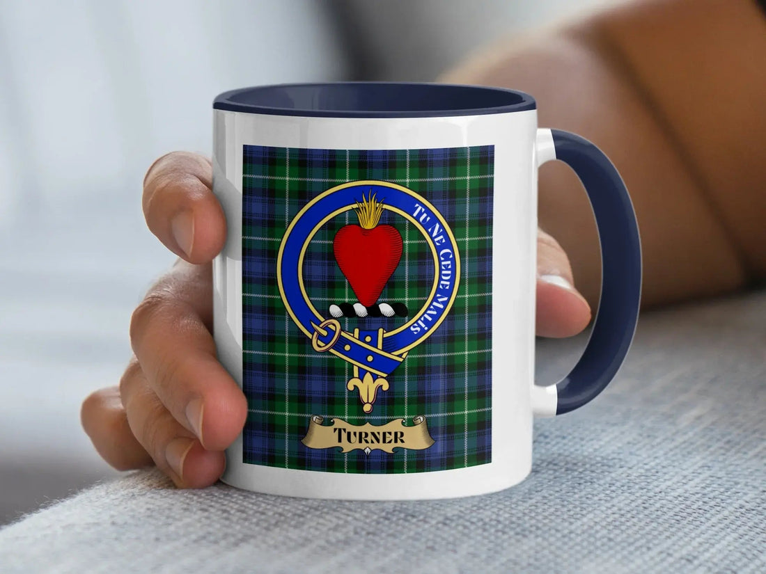 Turner family crest mug with the crest over a tartan background, a Scottish heritage gift for an occupational surname from the turner's trade