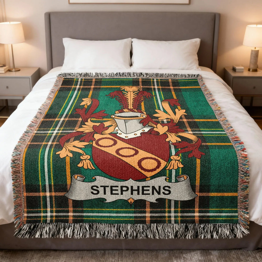 Stephens family crest woven blanket displayed against the Irish national tartan
