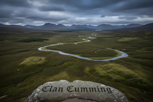 Scottish Highland landscape near Badenoch with moorland and distant hills, featuring the text “Clan Cumming,” representing the historic Scottish clan
