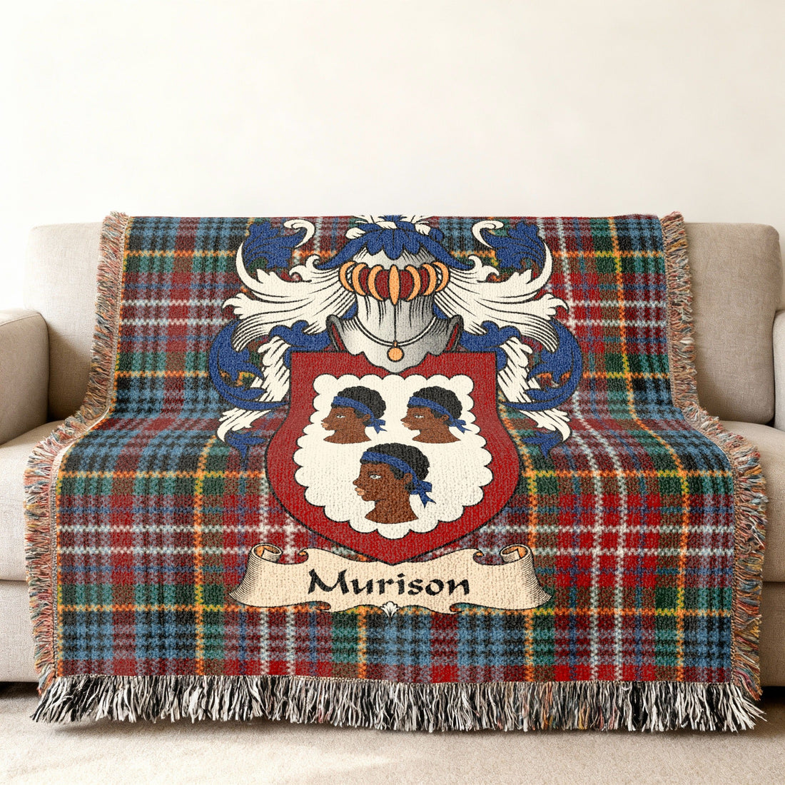 Murison Scottish family shield artwork on a woven blanket with Caledonia tartan-inspired background