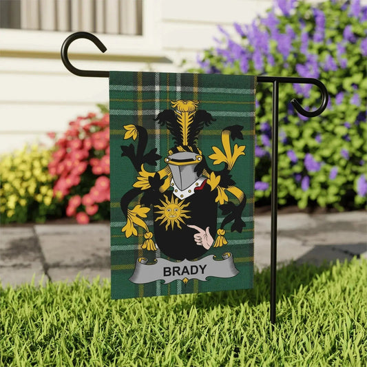 Green plaid garden flag with Brady family crest featuring a knight helmet and sun emblem