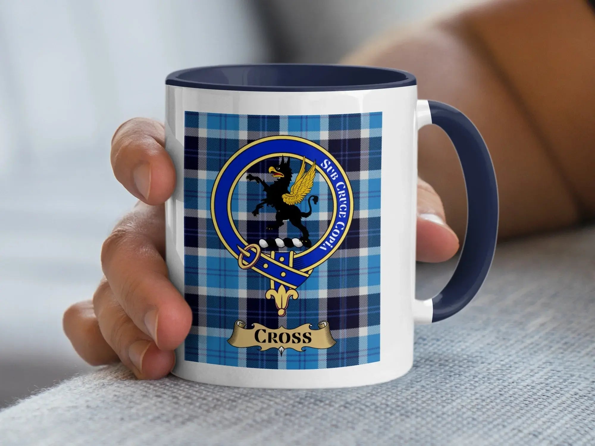 Cross family crest mug on a tartan background, a Scottish heritage gift for the Cross surname