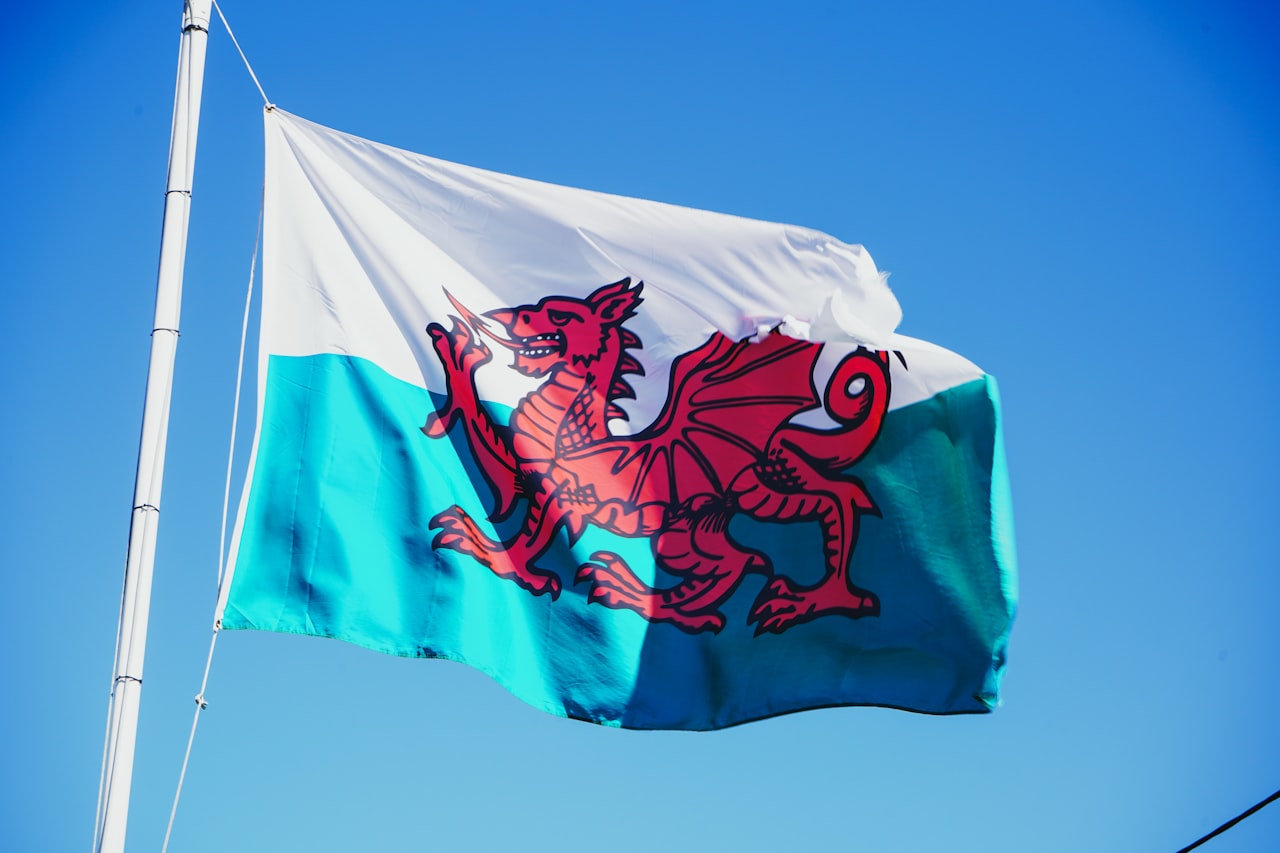 The Welsh flag Y Ddraig Goch, a red dragon on a green and white field, Wales' national symbol for over a thousand years