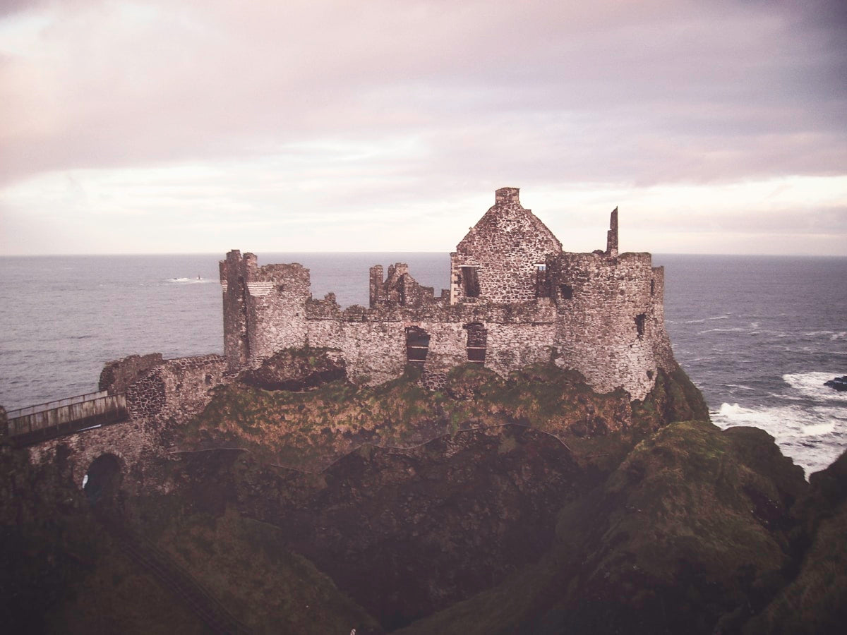 Ulster castle ruins coastal cliff Ireland O Neill dynasty medieval Gaelic fortress heritage northern province