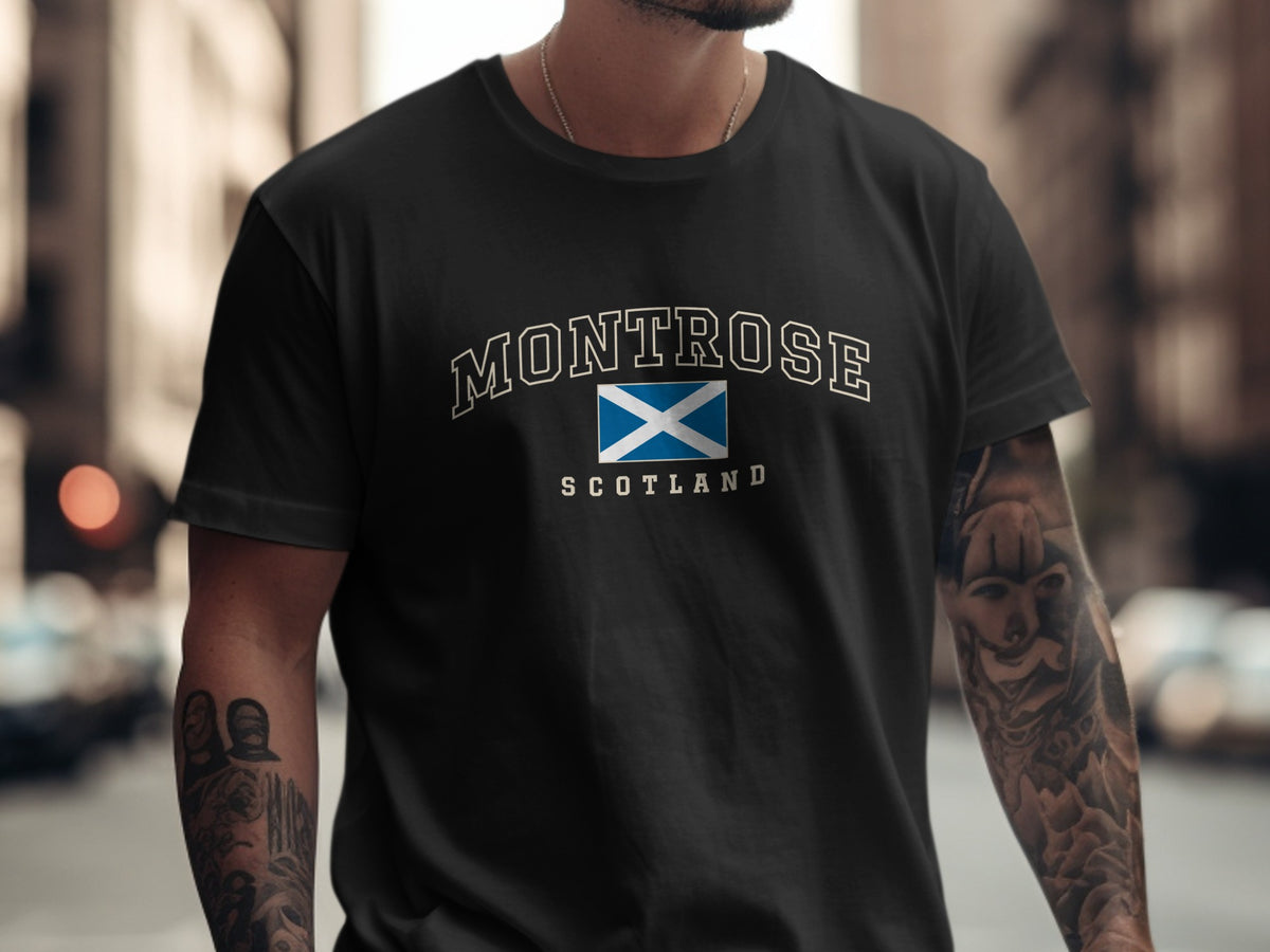 Model wearing the Black Montrose Scotland Comfort Colors T-shirt with the Scottish Saltire