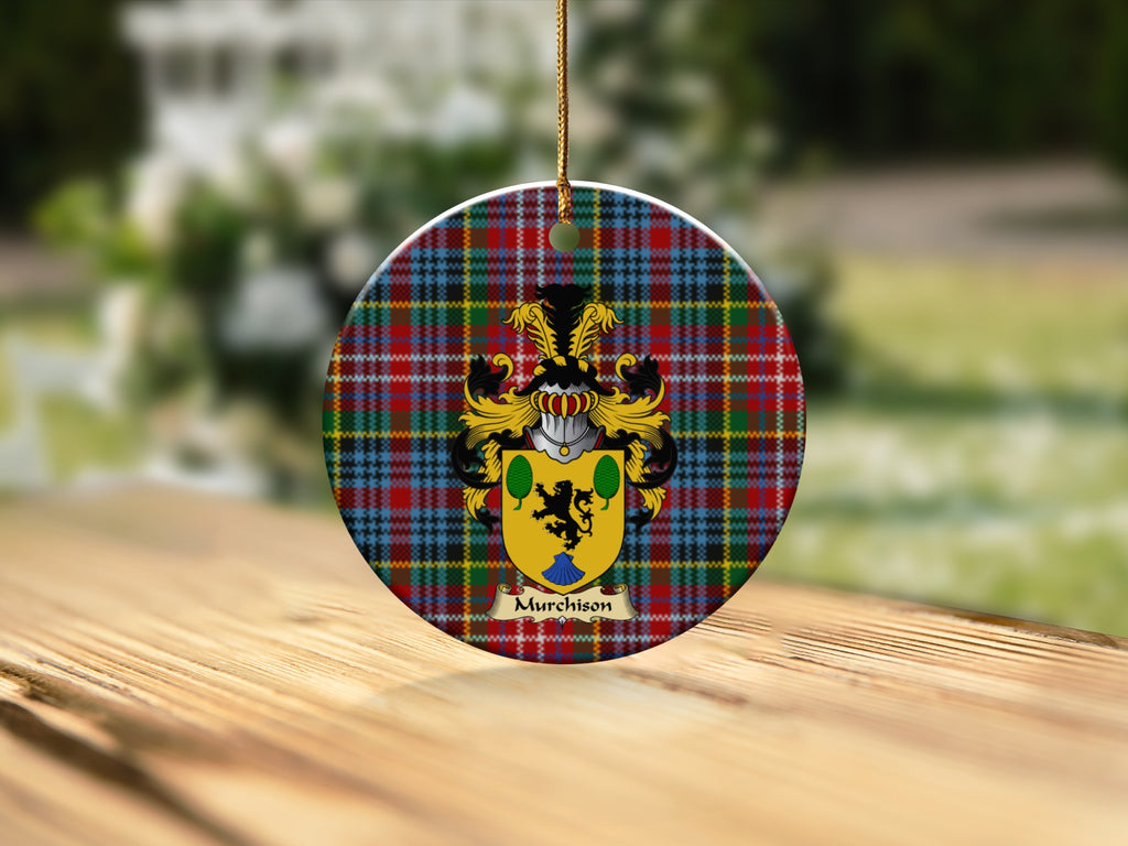 Round Murchison Scottish clan ornament with family crest on a Caledonia tartan background