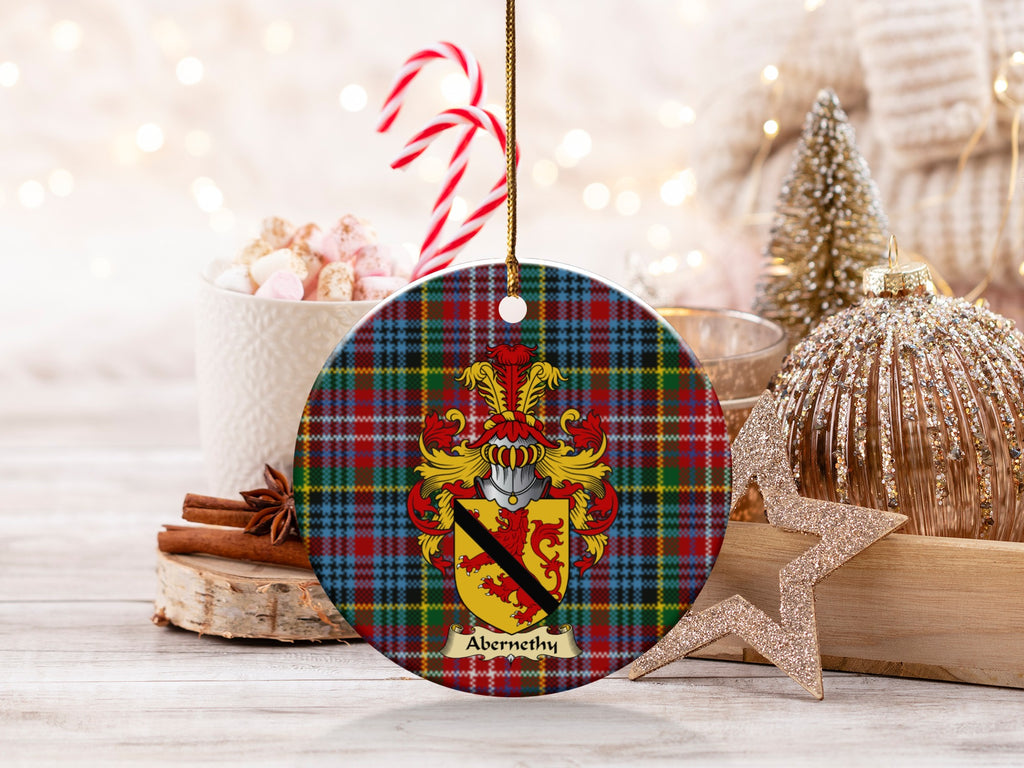 Abernethy family emblem ceramic Christmas ornament with Caledonia tartan background in festive holiday décor