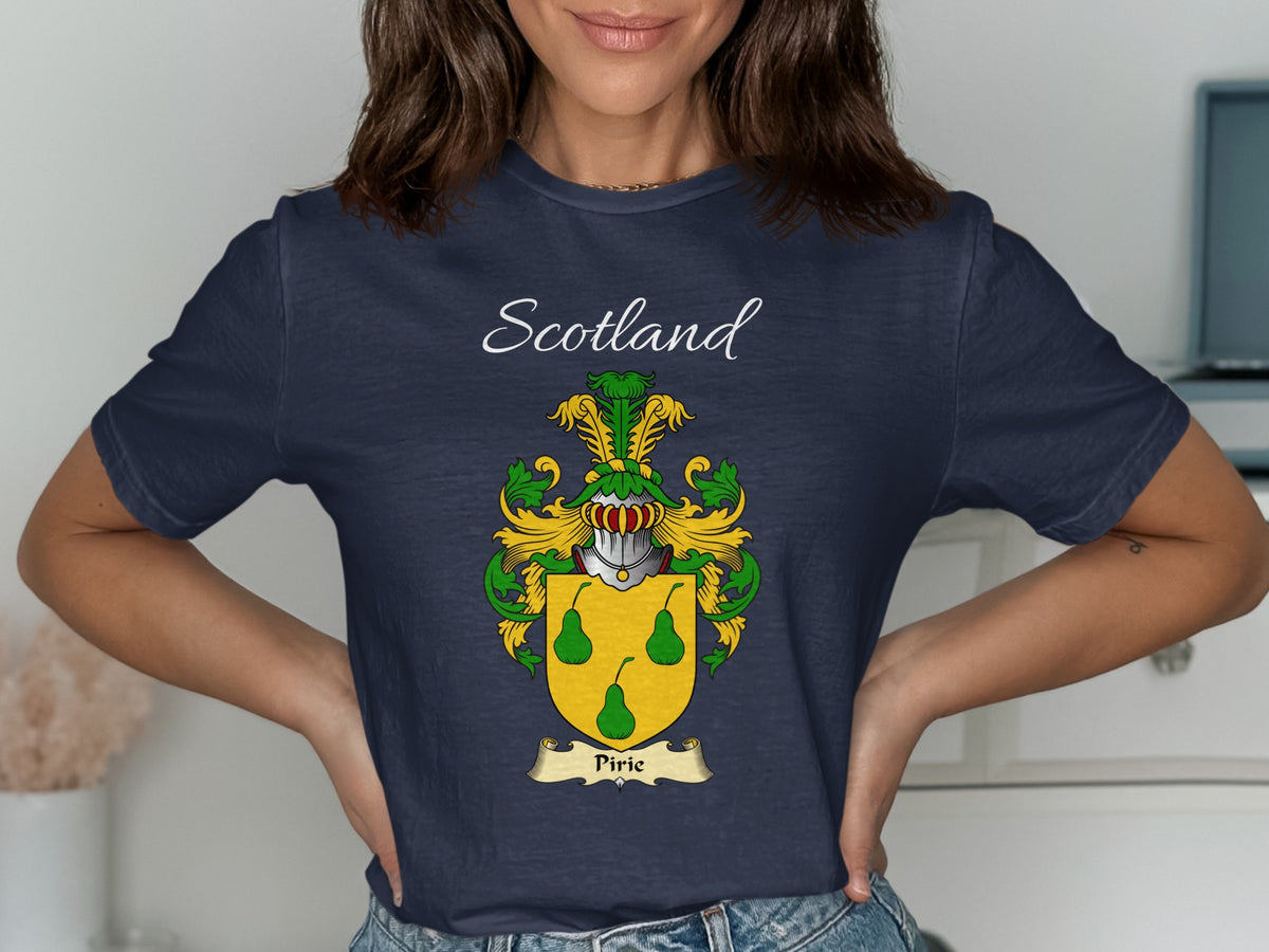Model wearing the navy Pirie family crest T-shirt featuring “Scotland” and the surname banner.