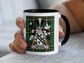 White mug with a black rim, featuring a green tartan pattern and a Watson family crest.