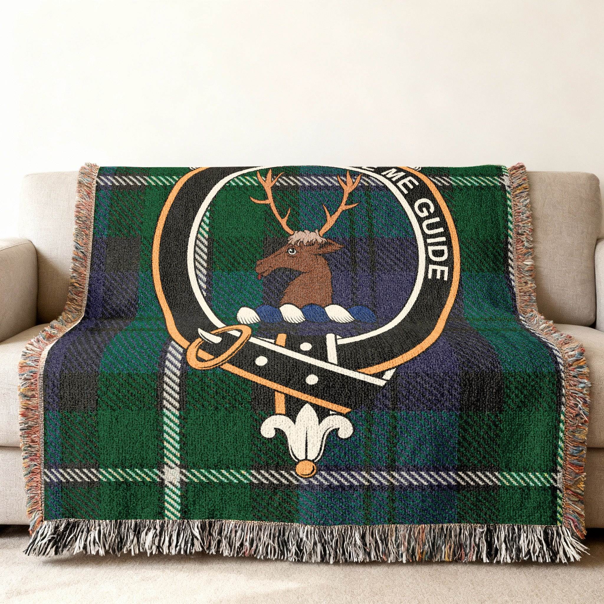 Forbes clan stag crest tartan woven blanket draped — Scottish plaid with fringe edges