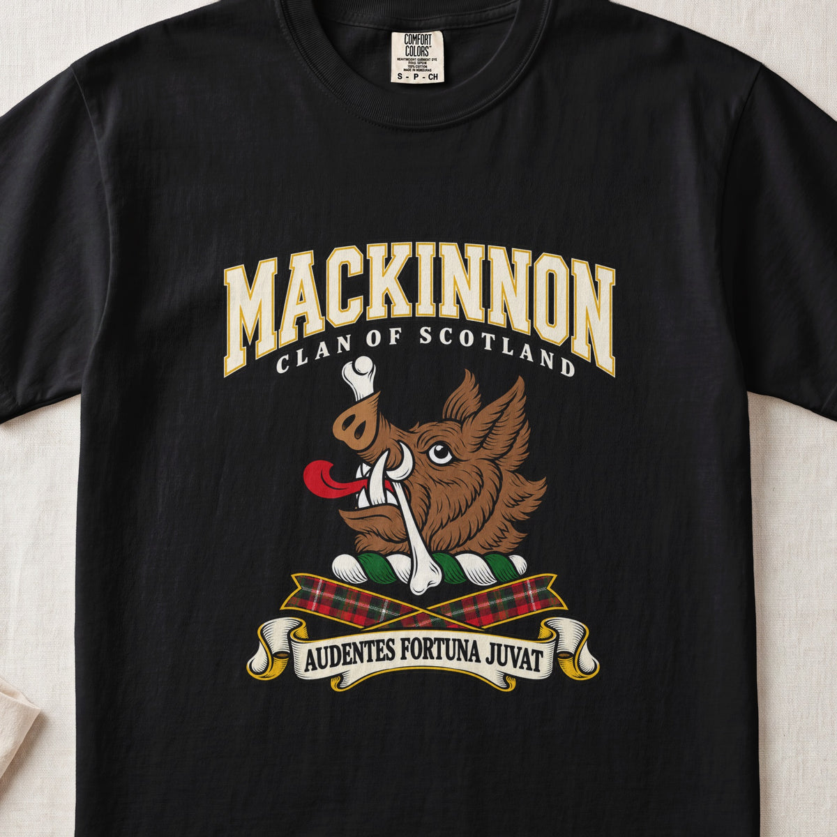 MacKinnon graphic T-shirt in Black, front flat lay showing varsity lettering and brown boar head with white tusks, red tongue and a white bone.