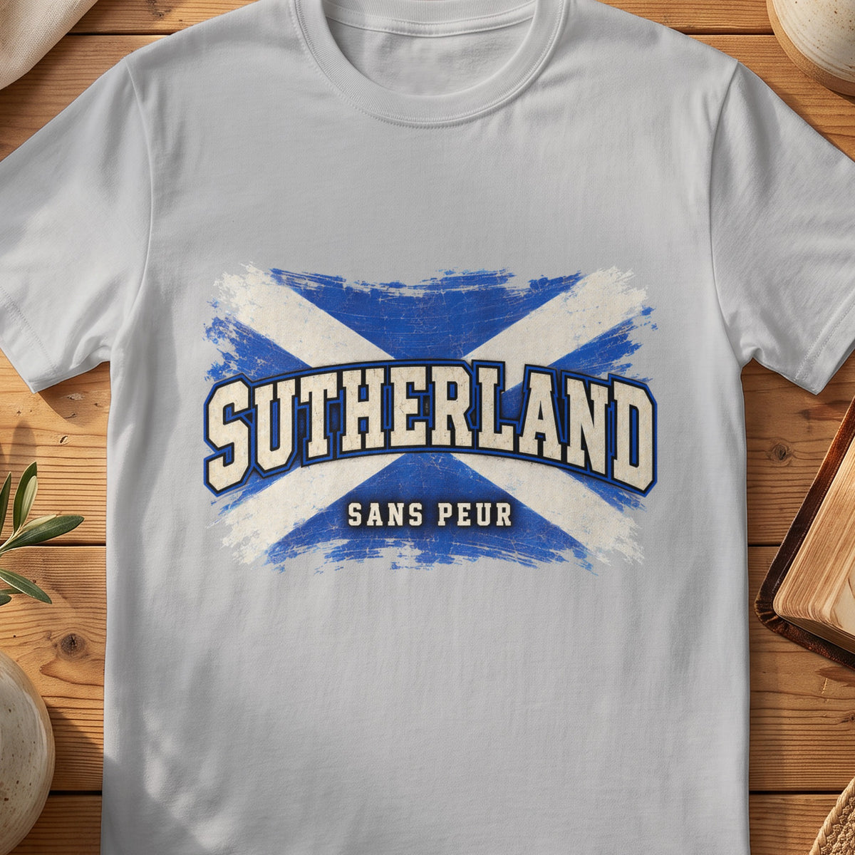 Sutherland Scottish Saltire T-shirt in Sport Grey, with distressed blue and cream flag and “Sans Peur” lettering.