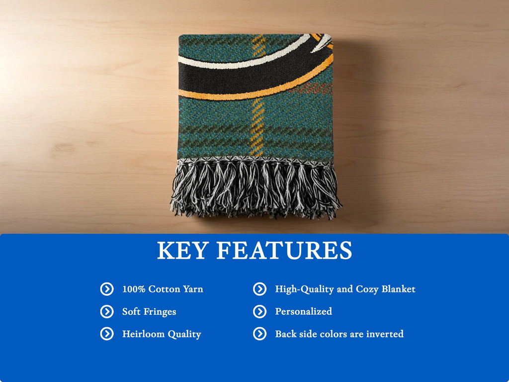Clan Farquharson cotton woven blanket folded — showing fringe edge and tartan weave texture