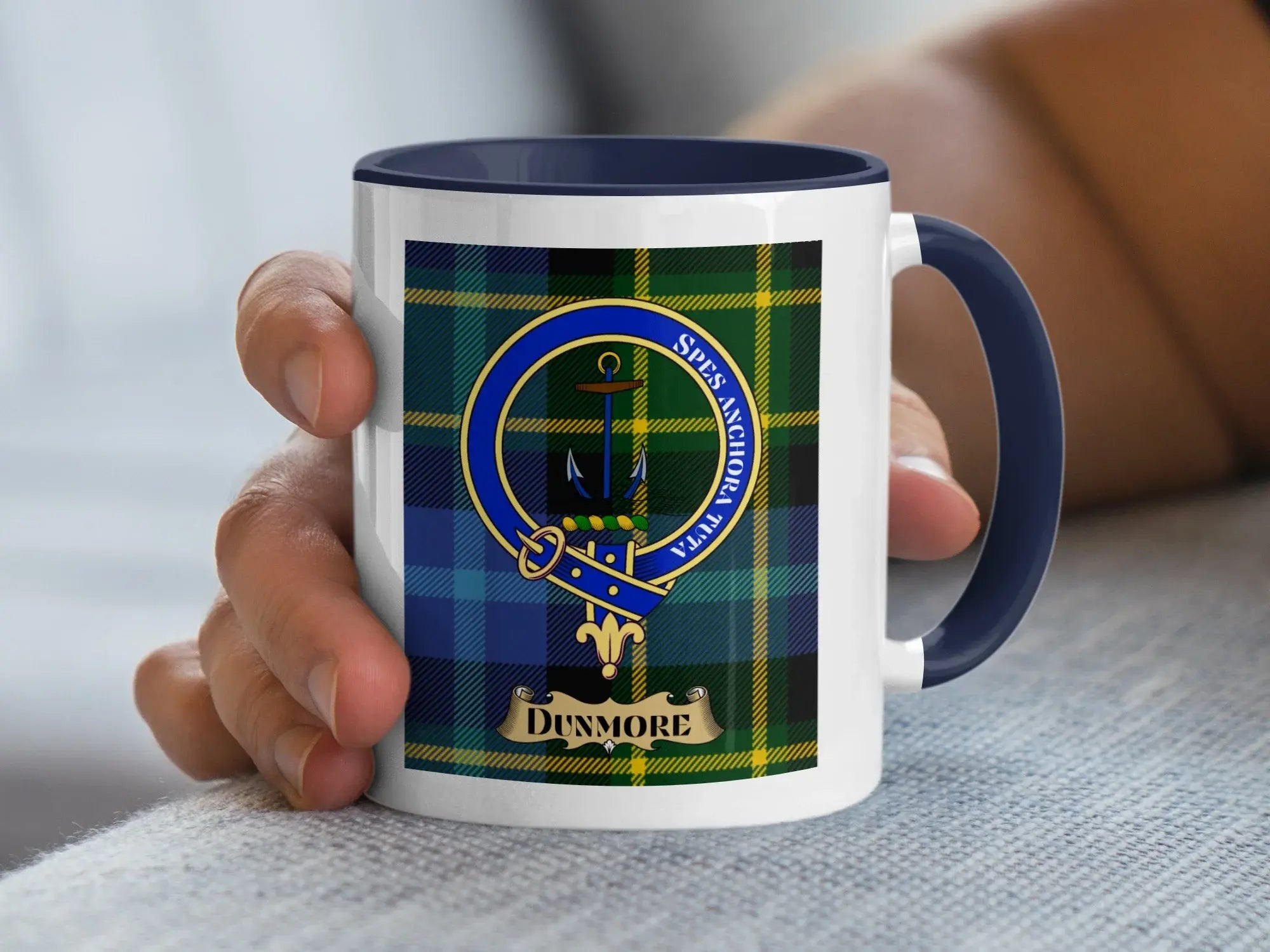 Dunmore family crest coffee mug with a tartan-background design