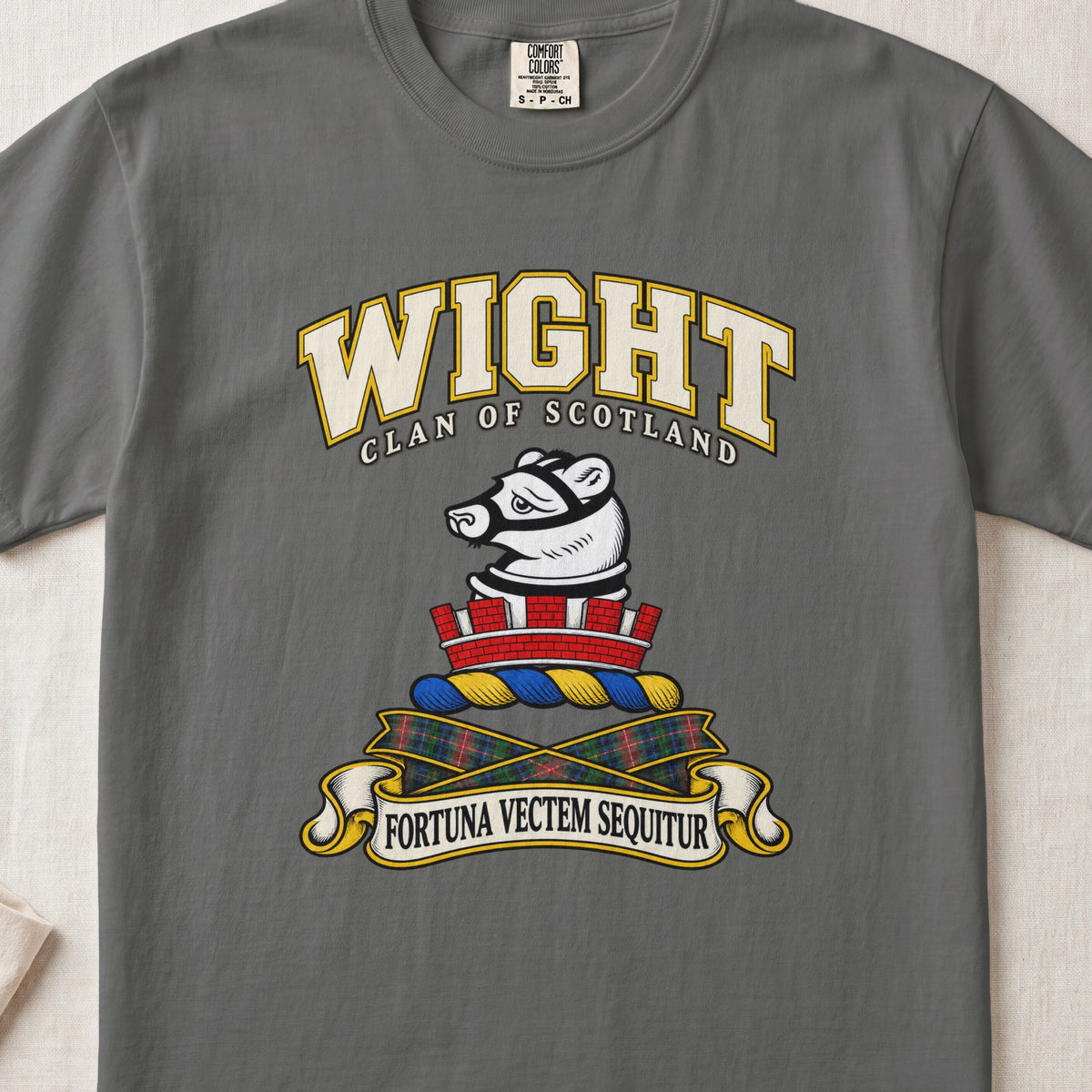 Wight Scottish clan T-shirt in Pepper, front view with a white muzzled animal head above a red mural crown and motto design.