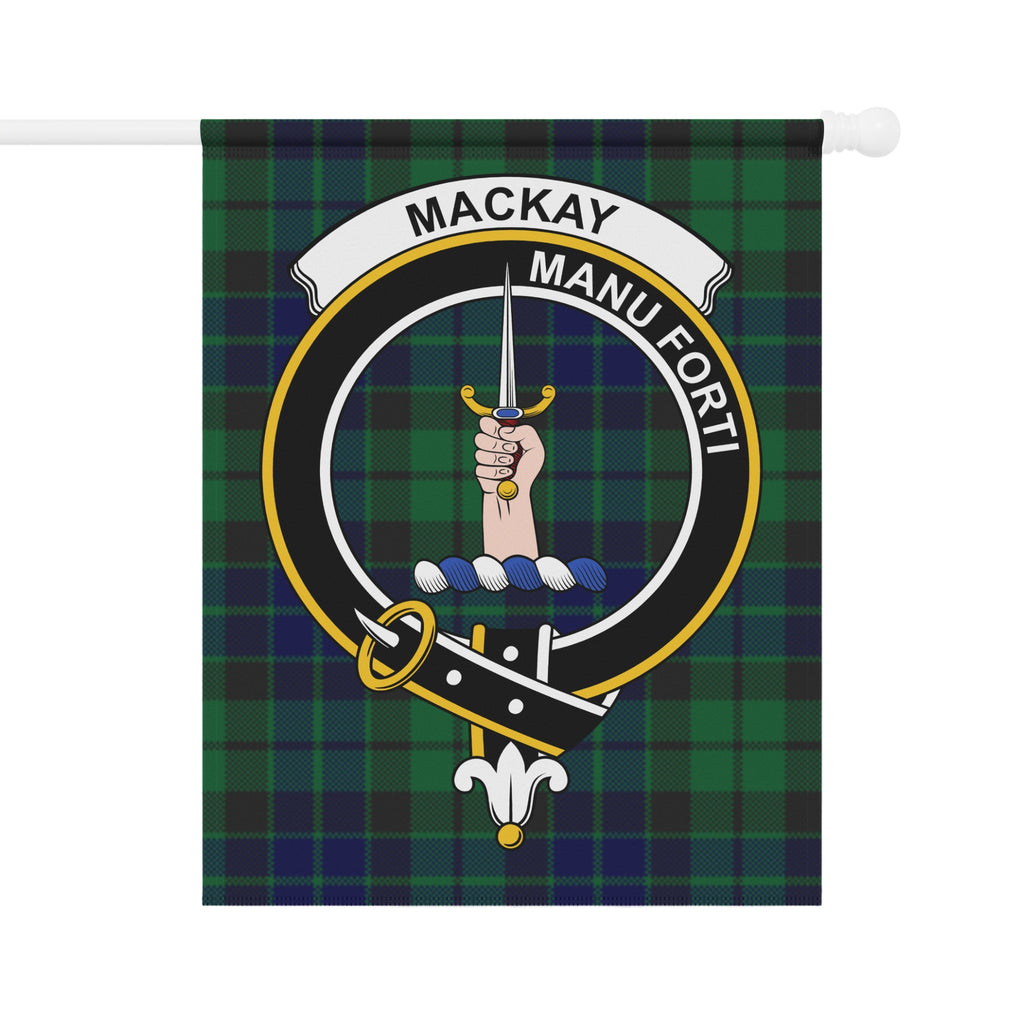 MacKay crest with hand holding sword on tartan garden flag — close-up
