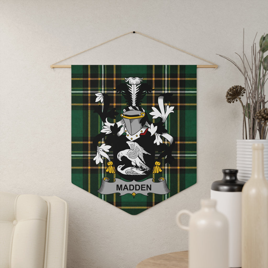 Green tartan banner featuring the Madden coat of arms with a silver helmet and white bird.