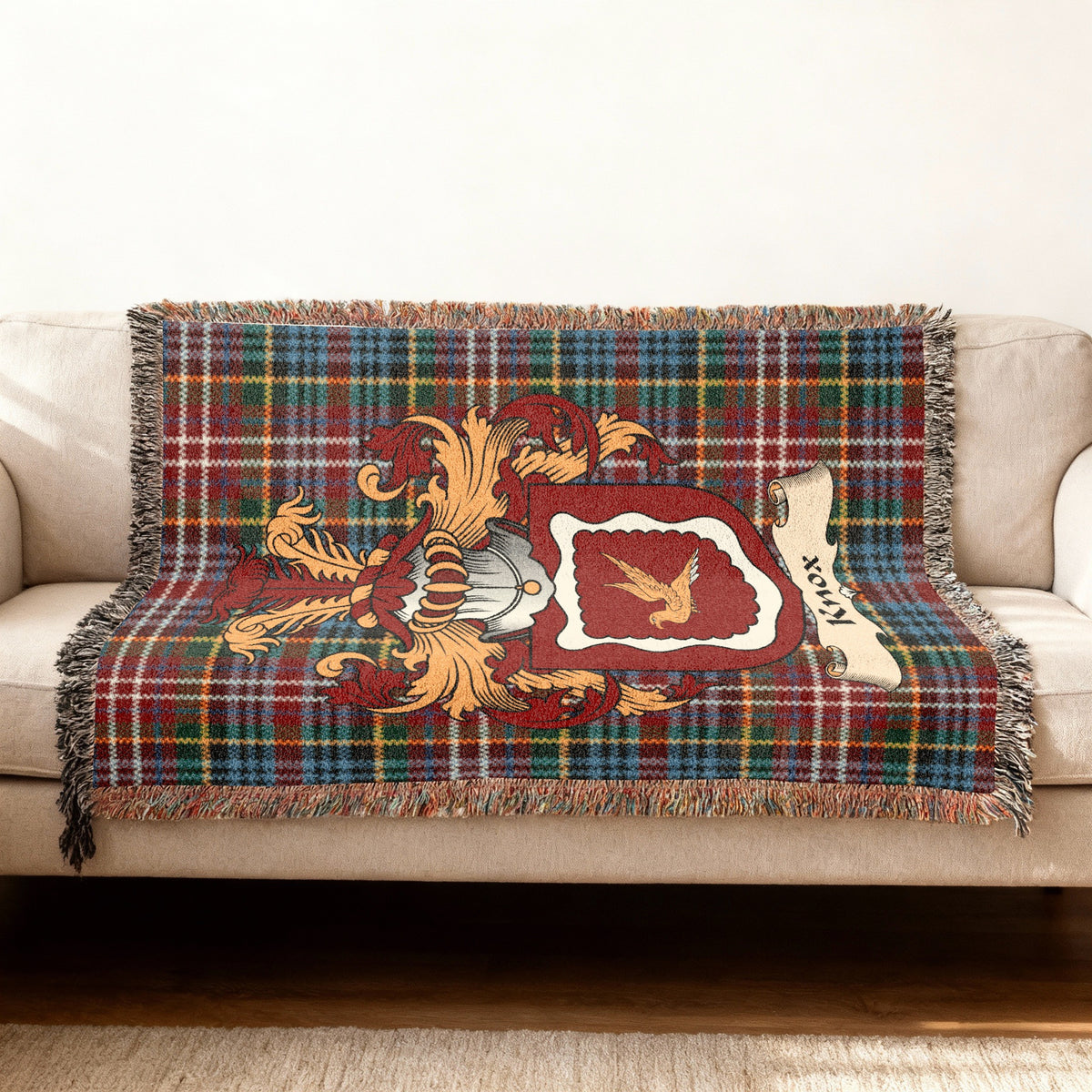 Knox Scottish woven blanket with family shield and Caledonia tartan background