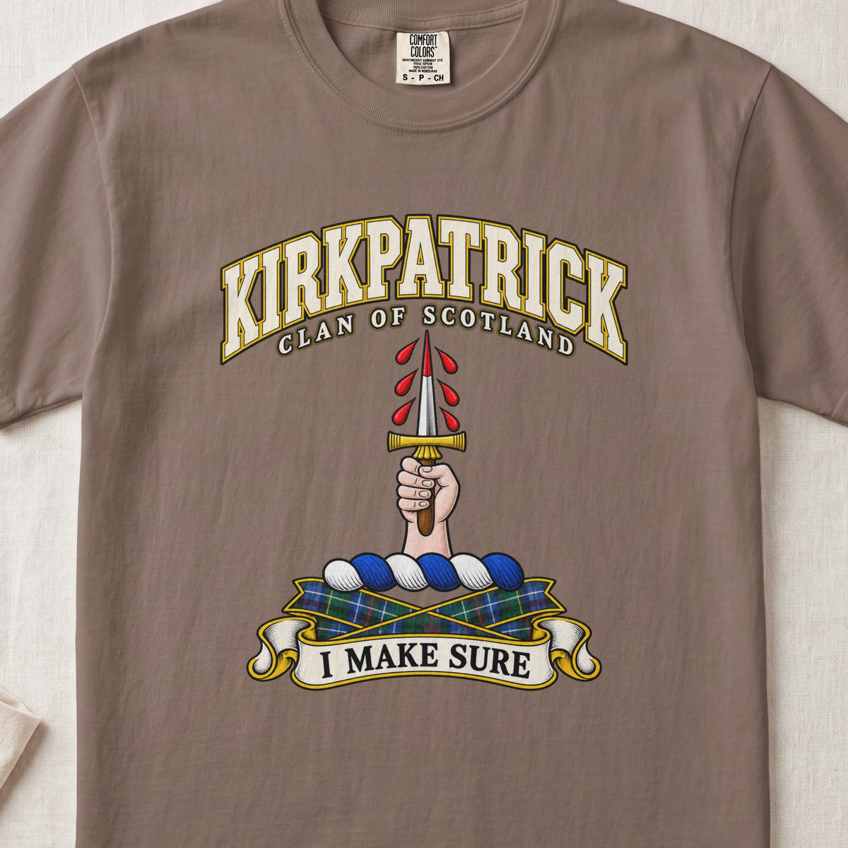 Kirkpatrick Scottish clan T-shirt in Espresso, front view with a hand holding an upright dagger with red droplets and motto design.