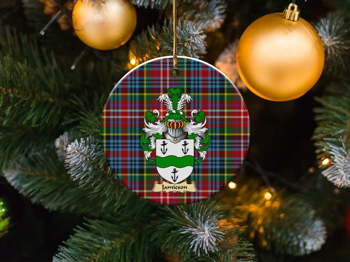 Jamieson family emblem ceramic Christmas ornament with Caledonia tartan background in festive holiday décor