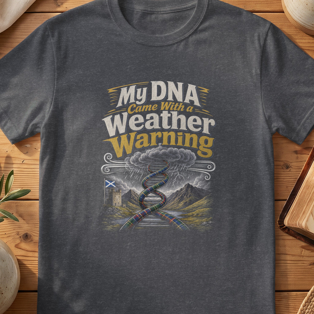 Dark grey Gildan 64000 unisex T-shirt flatlay with My DNA Came With a Weather Warning Scottish graphic design